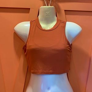 A sherbet orange tank top